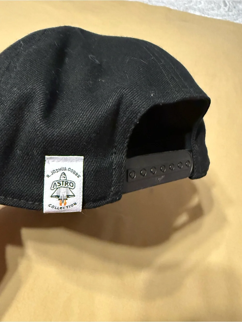 Astro Dobbs Black Snapback Hat with Rocket Patch. Josh Dobbs UT.